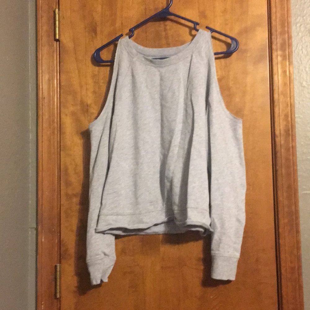 Victoria Secret gray open shoulder shirt.